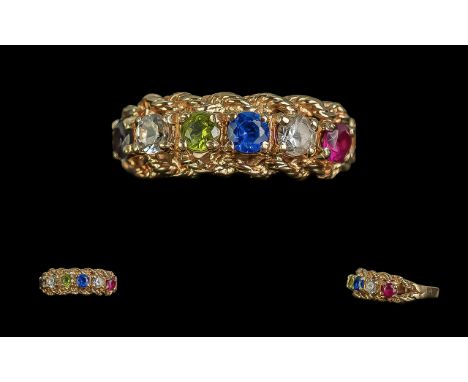 Ladies Attractive 10ct Gold Multi Gem Set Dress Ring excellent setting stamped 10ct wt with peridot, ruby and sapphire. Ring 