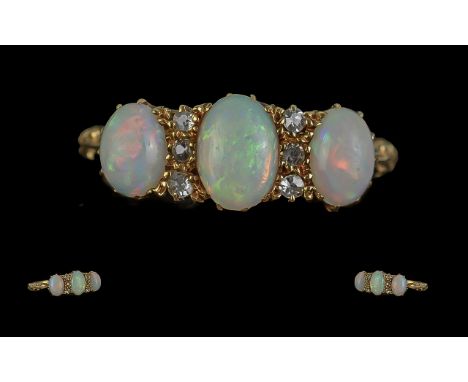 Antique Period Attractive 18ct Gold Opal & Diamond Set Ring, marked to interior of shank.  The three oval shaped opals of ple