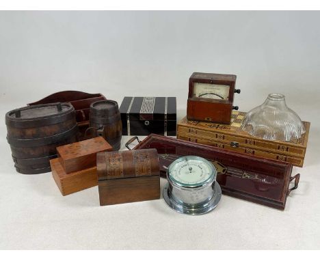 A group of collectors' items including a chrome cased aneroid barometer, wooden barrels, inlaid marquetry tea caddy, glass li