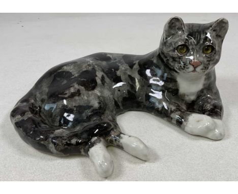 WINSTANLEY; a grey tabby cat number 7 in the lying position, height 17cm.Condition Report: With signs of crazing