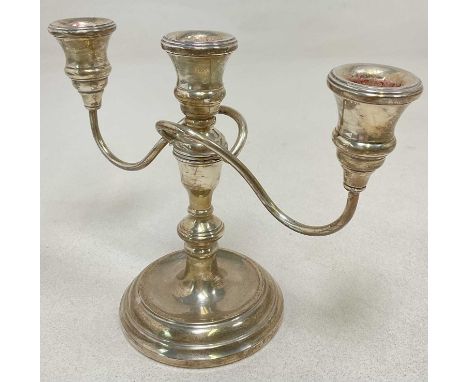 An Elizabeth II hallmarked silver loaded three light candelabrum, Birmingham 1989, height 17cm.Condition Report: Weighs appro