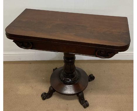 A William IV mahogany fold-over card table, raised on central column with four splayed feet, height 71cm, width 91cm, depth 9