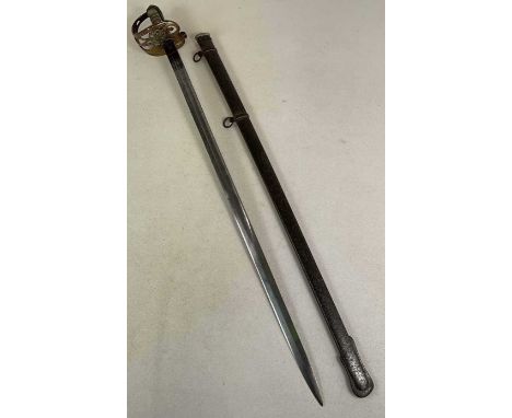 A Victorian 1887 Wilkinson sword and scabbard, the blade deocorated with Queen's crown and cipher and floriate design, length