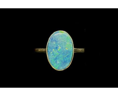 A 9ct yellow gold and doublet opal ring, size P 1/2, approx 2.4g.