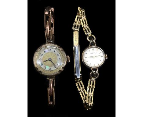 JAEGER LECOULTRE; vintage lady's vintage 9ct yellow gold wristwatches, one with sprung bracelet, the second with gold plated 