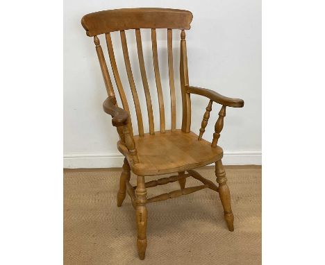 A high bar back, kitchen Windsor beech elbow chair, with swept arms, saddle seat and turned front legs.Condition Report: Prio