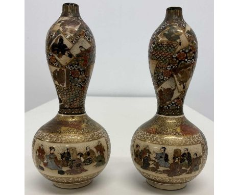 A pair of Japanese Meiji period Satsuma bottleneck vases, decorated with figures and landscapes, painted marks to base, heigh