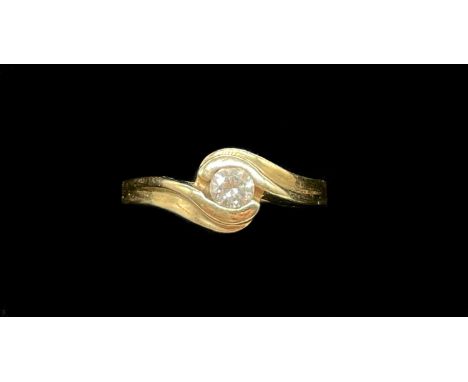A 9ct yellow gold diamond set solitaire ring, the round brilliant cut stone weighing 0.20ct, size O, approx 2.8g.