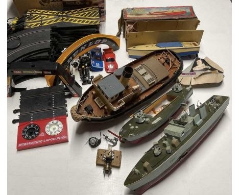 Three scratch built boats representing a tug, Thor of Linton, and two motor torpedo boats, also a Hornby tin speed boat, a bo