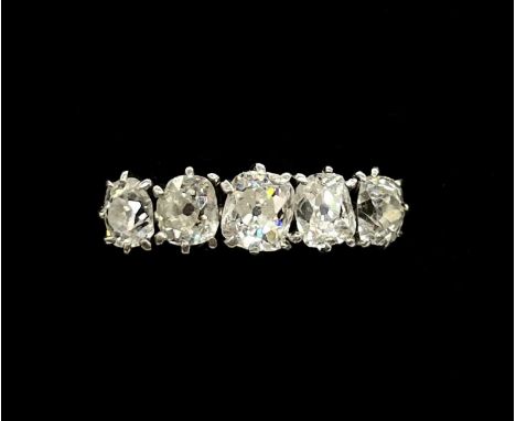An 18ct yellow gold five stone diamond ring, the cushion cut diamonds totalling approx 1ct, size N 1/2, approx 2.1g.