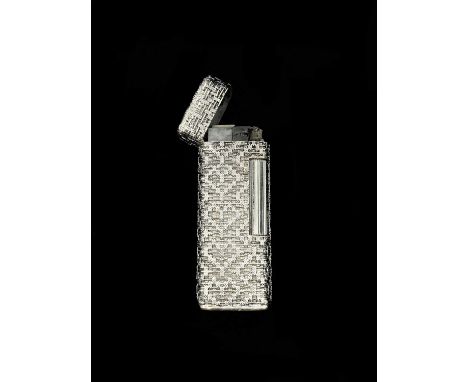 A textured 18ct white gold lighter of rounded rectangular form, height 65mm, approx 99.9g.Provenance: The vendor purchased th