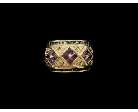 A 9ct yellow gold diamond, ruby and sapphire broad dress ring, size M 1/2, approx 10.9g.Condition Report: All stones present,