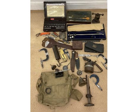 A quantity of gauges and engineering equipment, also including small oil cans, a blow torch, pocket knives and other tools