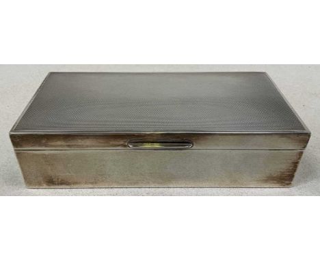 MAPPIN &amp; WEBB; an Elizabeth II hallmarked silver cigarette box of rounded rectangular form, with engine turned decoration