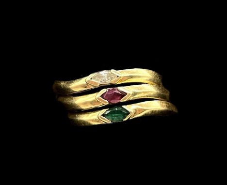 An 18ct yellow gold three-sectioned 'trilogy' ring, each band set with a single stone, diamond emerald and ruby, size approx 