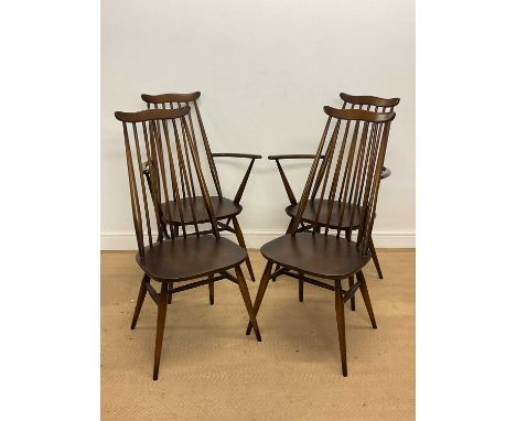 ERCOL; four stick back dining chairs, comprising of two carvers.