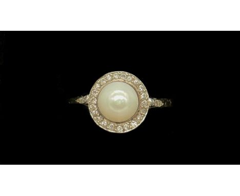An 18ct white gold diamond and pearl ring, size L, approx 2.97g.