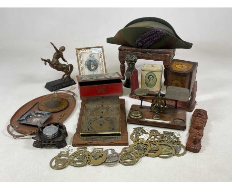 An interesting group of collectors' items including vintage tins, bicorn hat, brass postal scales, etc.