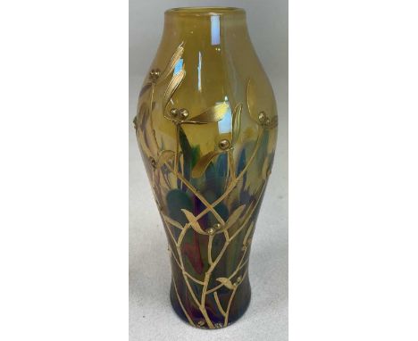 An early 20th century art glass vase, with gilt mistletoe overlay and amber tinted main body, unsigned, height 20.5cm.Conditi