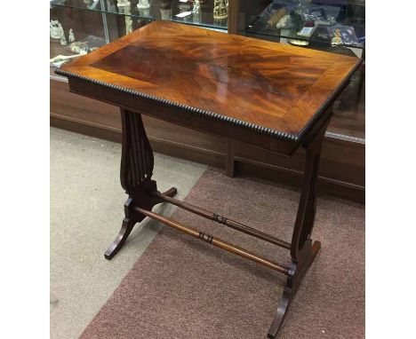 EARLY VICTORIAN FLAME MAHOGANY SIDE TABLE
with rosewood crossbanded and bobbin edged top, with lyre base adjoined by two turn