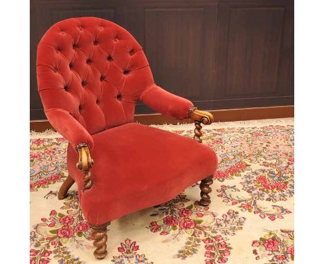 VICTORIAN BUTTON BACK OPEN ELBOW CHAIR
upholstered in crimson velvet, with moulded arm terminals, on spiral turned forelegs 

