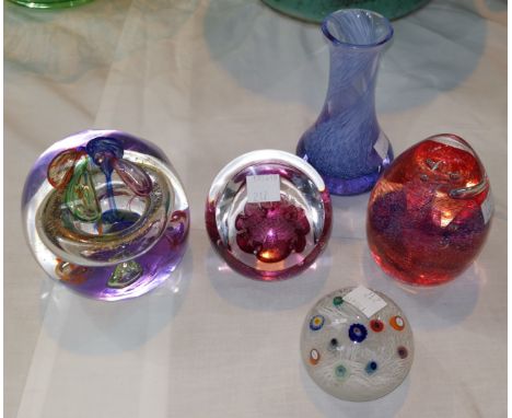 Three Caithness paperweights, another dumpy shaped paper wieght and a similar vase 