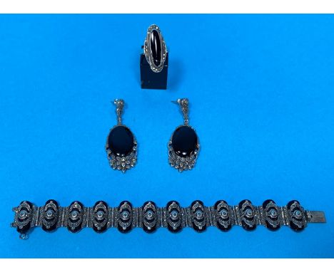 A1930's marcasite and French jet bracelet with matching ring and earrings; a 1930's cocktail watch; marcasite set jewellery 