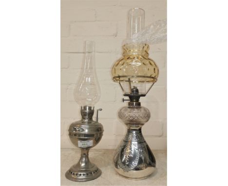 An oil lamp with silver plated bulbous base and cut glass reservoir; a similar lamp made by Little Jewel, U.S.A. 