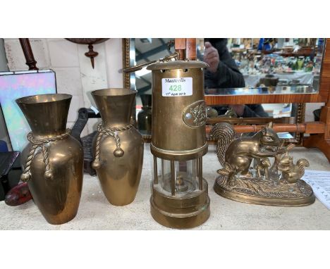A brass miners' lamp with Cymru plaque; a brass squirrel; 2 vases; a brass firescreen and coal scuttle 