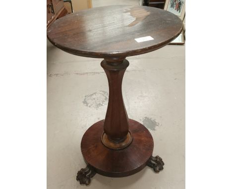 A 19th century rosewood wine table, baluster support with later top and paw feet; a 1930's barometer/brush rack 