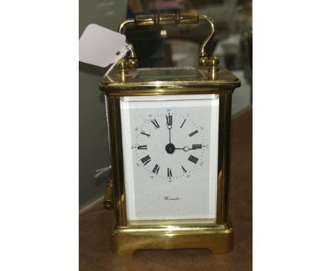 A modern brass carriage clock by Worcester 