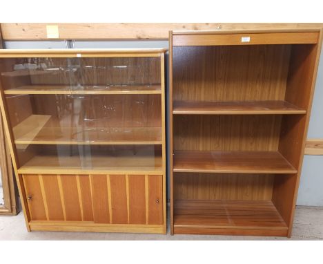 A 1960's teak 3 height bookcase; a 1950's light oak bookcase enclosed by 2 glass and 2 panelled sliding doors 