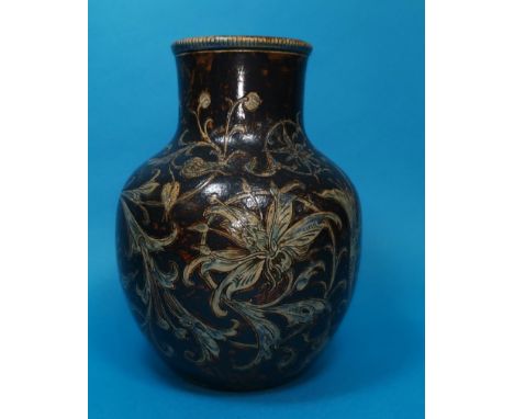 A stoneware bulbous vase by Martin Brothers, with incised decoration of scrolling orchids, blue on brown background, base ins