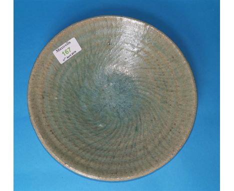 A 1950's studio pottery bowl with blue glaze over incised ground, indistinct seal mark, 9" (mark appears to be&nbsp; Katherin