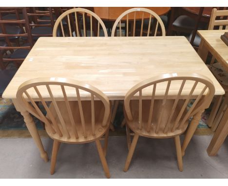 A light wood kitchen table