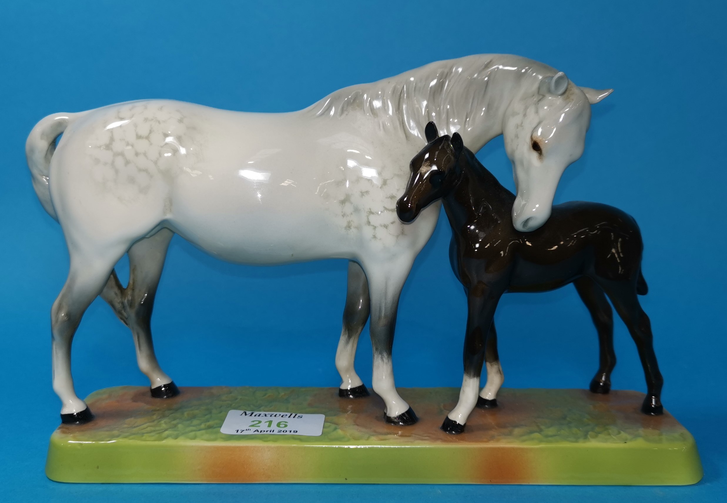 A Beswick china figure of a horse and foal, 9.5