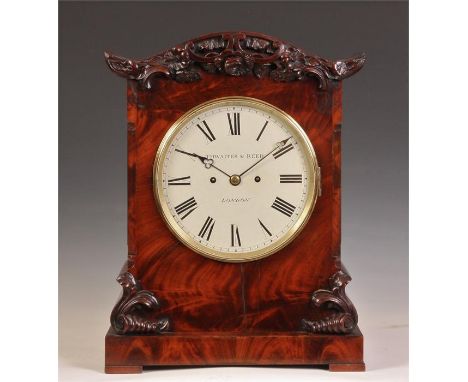 THWAITES &amp; REED LONDONA&nbsp; late Regency figured Mahogany BRACKET CLOCK with carved serpentine pediment and leaf work c