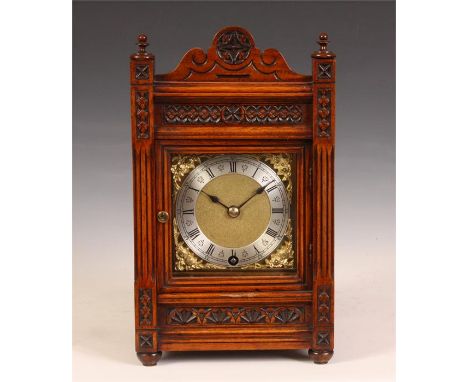 A late 19th Century carved Walnut Winterhalder &amp; Hofmeier MANTEL CLOCK in the aesthetic style.&nbsp; The square brass and