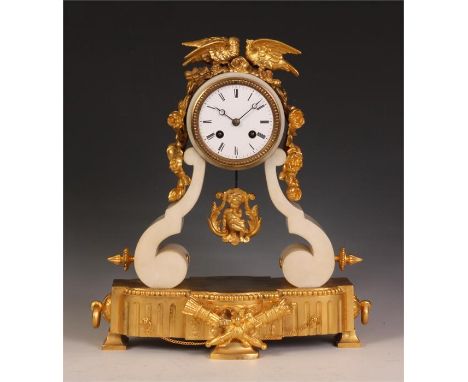 A stylish late 19th Century French Gilt Metal and Onyx MANTEL CLOCK, the elaborate case with scrolled sides and love bird cre