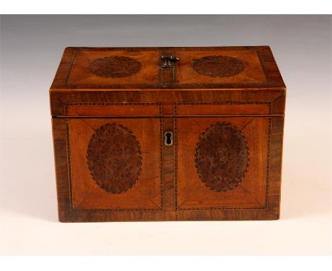 A George III double sided oval burr yew panelled, inlaid and crossbanded Satinwood ground TEA CADDY, with divided lead lined 