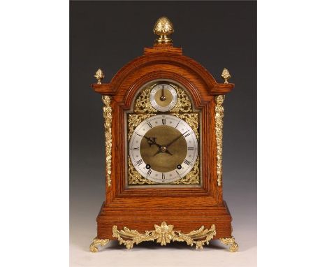 A good late 19th Century German Winterhalder &amp; Hofmeier honey coloured Oak dome-top BRACKET CLOCK with cast gilt brass mo