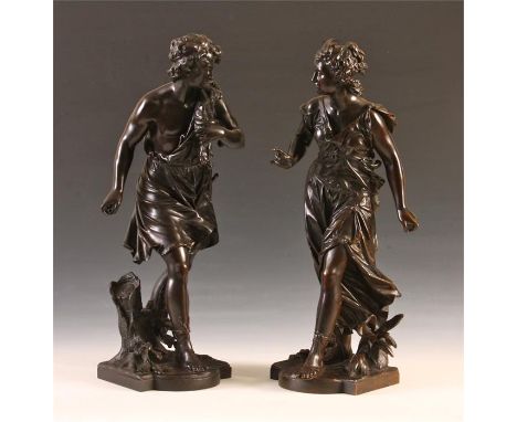 After AUGUSTE MOREAUA fine pair of 19th Century brown patinated Bronze French standing FIGURES of Apollo and Diana, on bowed 