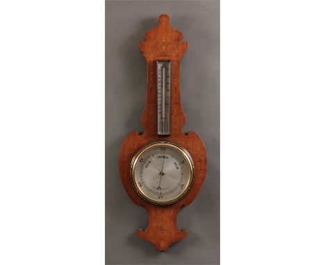 A late 19th Century florally inlaid Mahogany ANEROID BAROMETER/THERMOMETER with silvered dials 84cms high&nbsp; 