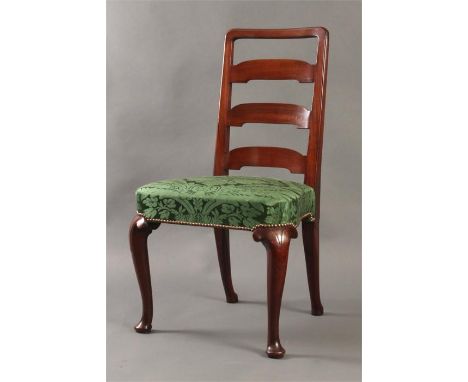 An unusual George I ladder back Walnut SIDE CHAIR the emerald green florally upholstered seat with pronounced rounded corners