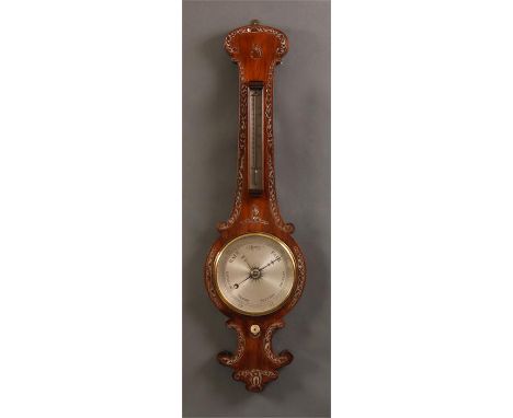 An early Victorian mother of pearl inlaid Rosewood WHEEL BAROMETER with thermometer to the stem and engraved silvered 8&rdquo