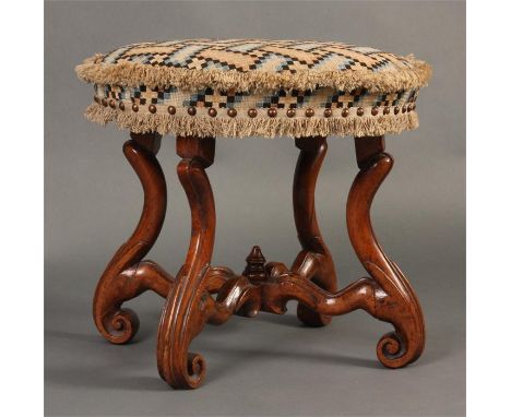 A good late 17th Century Walnut DRESSING STOOL on Breganza style carved scrolled legs and feet joined by a shaped X stretcher