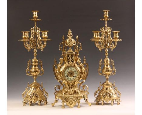 An ornate late 19th Century French matched three piece Cast Brass MANTEL GARNITURE CLOCK SET with five branch Candelabra and 