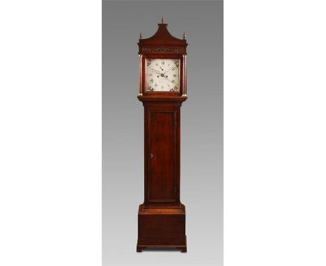 CAVELL, IPSWICHA George III Oak eight day LONGCASE CLOCK. The hood with glazed side windows, blind fretwork frieze and pagoda