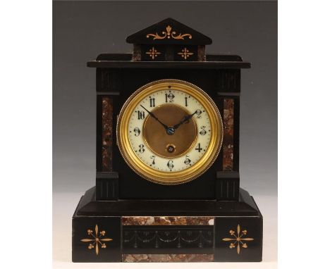 A late 19th Century Black Slate and inlaid Rouge Marble MANTEL CLOCK with shaped pediment above a gilt dial with recessed cen