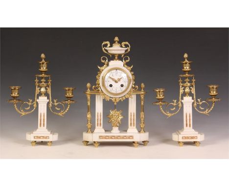 A stylish late 19th Century Cast Brass and White Marble THREE PIECE MANTEL GARNITURE CLOCK SET with scrolled arm three branch